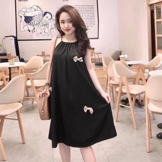 Váy cổ yếm đính nơ nổi cực yêu