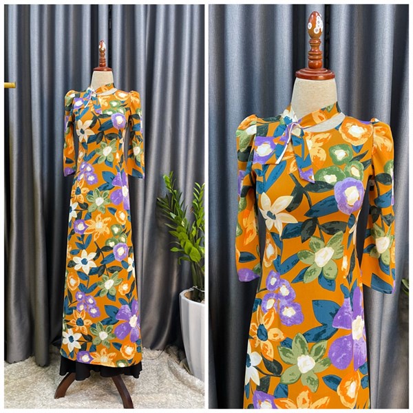 Áo dài hoa to màu vàng nghệ tay lửng phồng