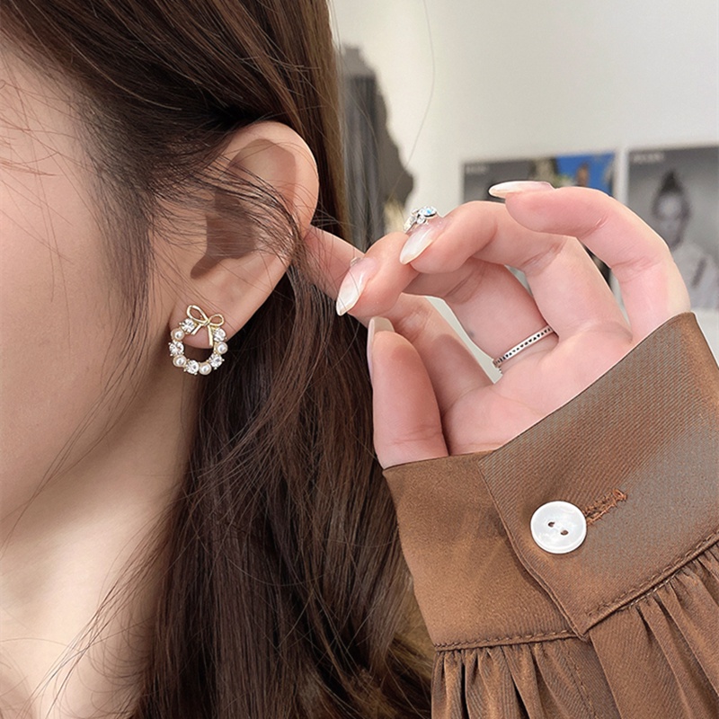 Bông tai trang trí nơ đính hạt ngọc trai phong cách Hàn Quốc dành cho nữ