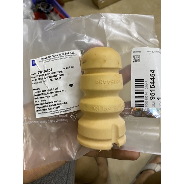 Tăm bông giảm sóc sau xe chervolet spark xịn chính hãng