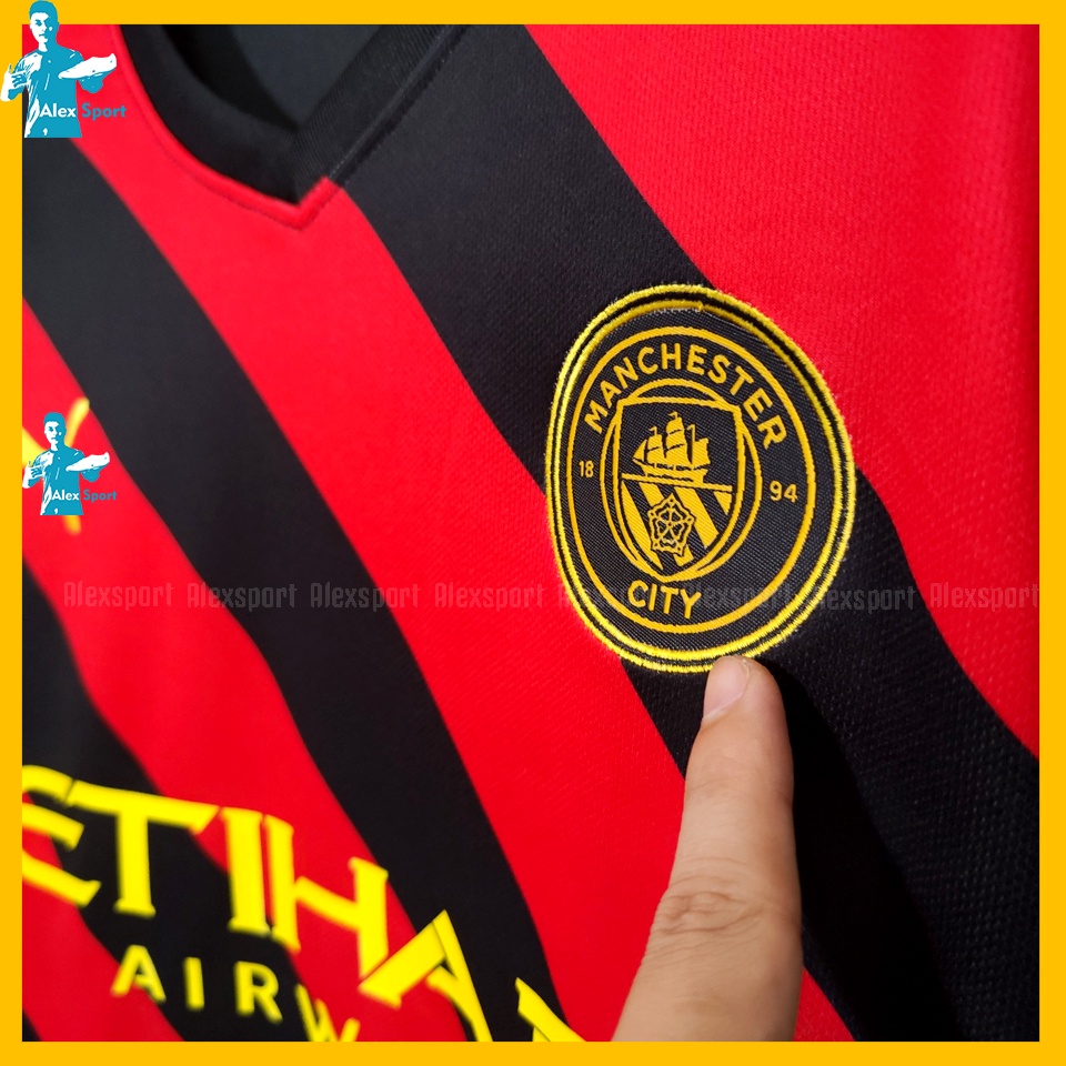 LOGO THÊUBộ Quần Áo Bóng Đá CLB Manchester City Sân Khách Màu Đen đỏ BẢN ĐẸP 22-23 - Alex Sport