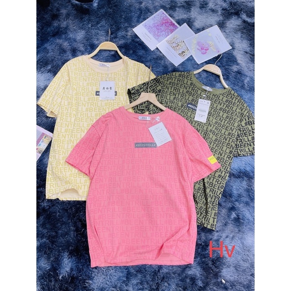 Áo phông thụng chữ logo tay vàng