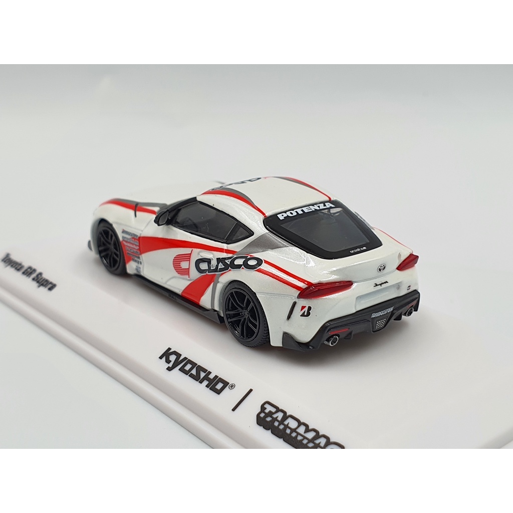 Xe Mô Hình Toyota GR Supra CUSCO 1:64 Tarmac Works/Kyosho (Trắng)