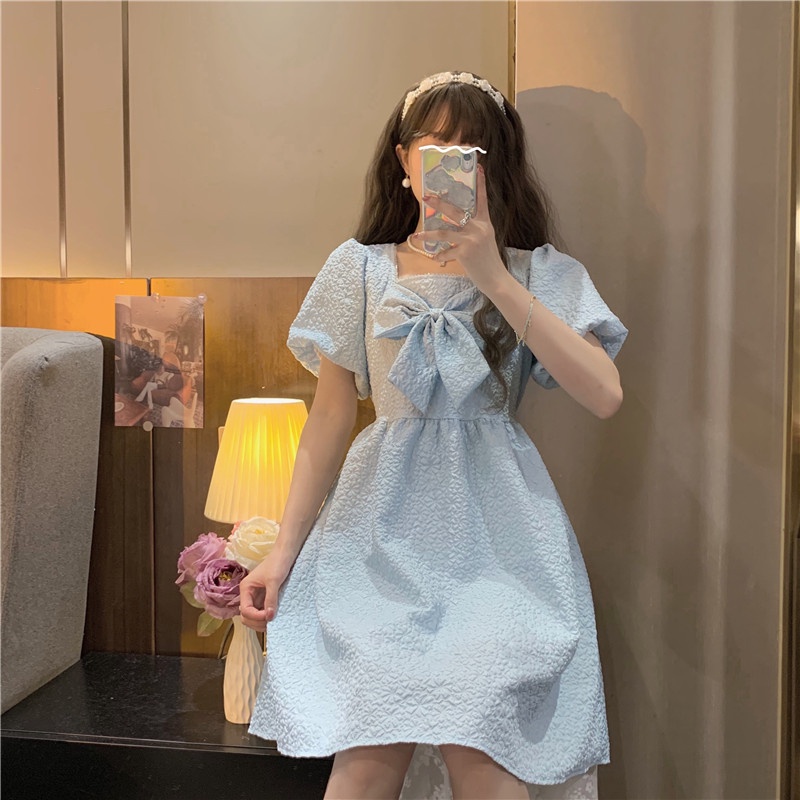Đầm Trắng Cổ Vuông Tay Phồng Đính Nơ Xinh Xắn Thời Trang Dự Tiệc Cho Nữ
