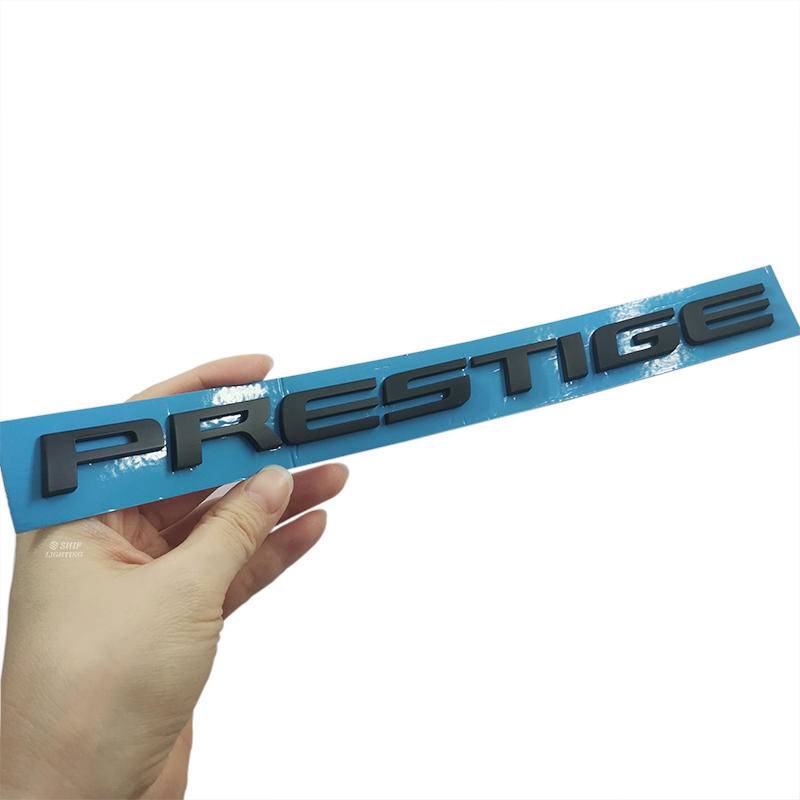 1 Miếng dán trang trí xe hơi bằng ABS màu đen in chữ PRESTIGE