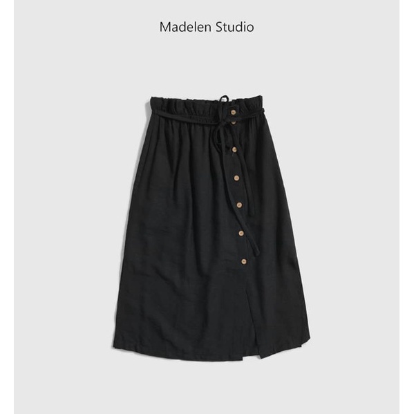 Chân váy midi đũi xẻ tà khuy lệch buộc nơ màu đen Madelen by len