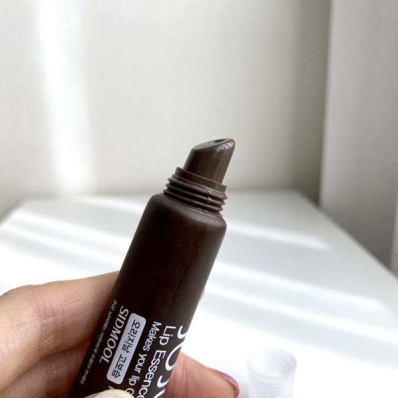 Date T10/25 Son dưỡng môi Sidmool Jojoba/Centella lip essence 13ml