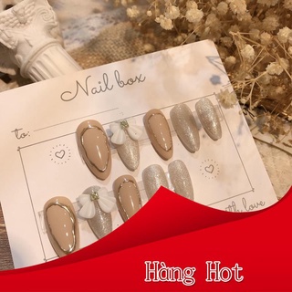 Móng Giả thiết kế mắt mèo đính nơ Hàn Quốc julynails.vn nb102