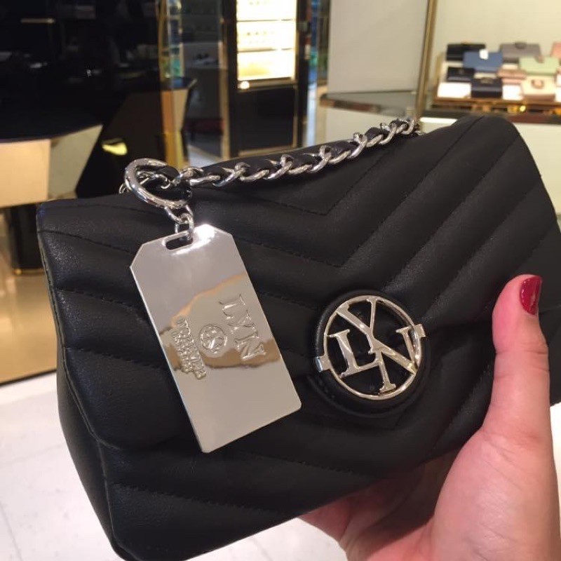 Túi lyn đeo chéo khoá tròn