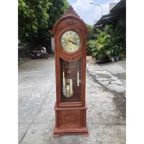 Đồng hồ  dược sư gỗ  hương  đá  kích  thước cao  186 cm ngang 56 sâu 26 cm.