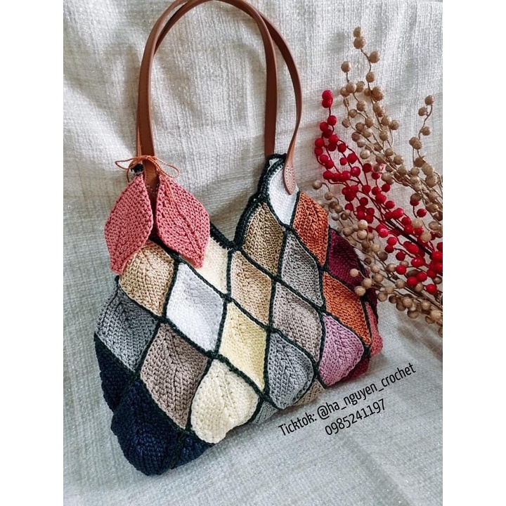 Quai xách đục lỗ hình lá