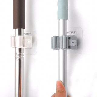 Móc dán tường treo chổi tiện lợi