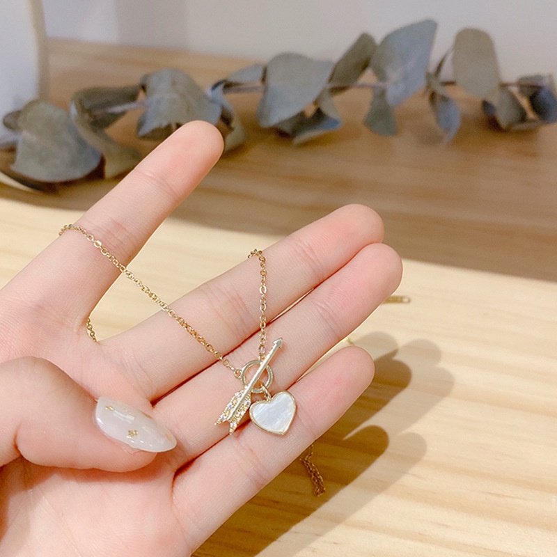 Vòng cổ Mặt Hình Trái Tim / Mũi Tên Bằng Kim Loại Màu Vàng Thời Trang Thanh Lịch Lãng Mạn Cho Nữ