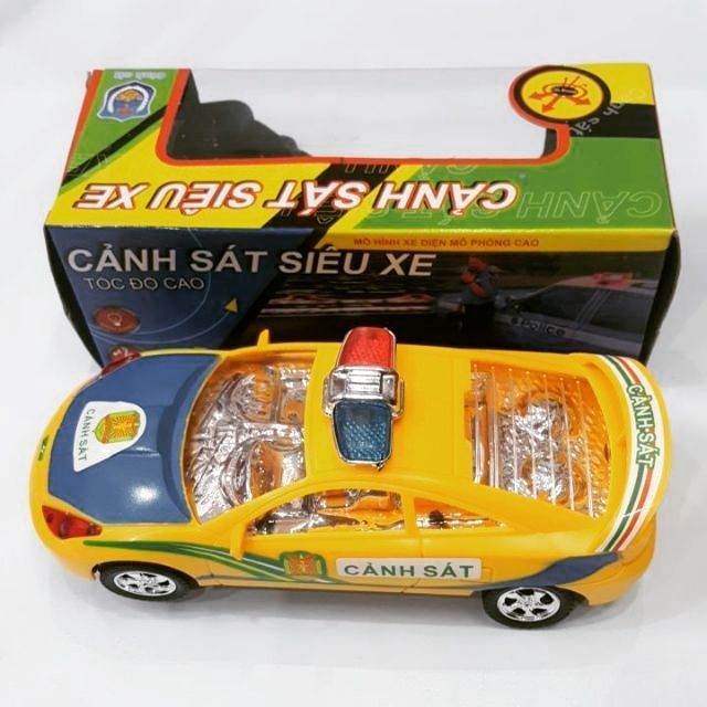 Xe cảnh sát chạy pin có đèn, nhạc, xoay 360 512