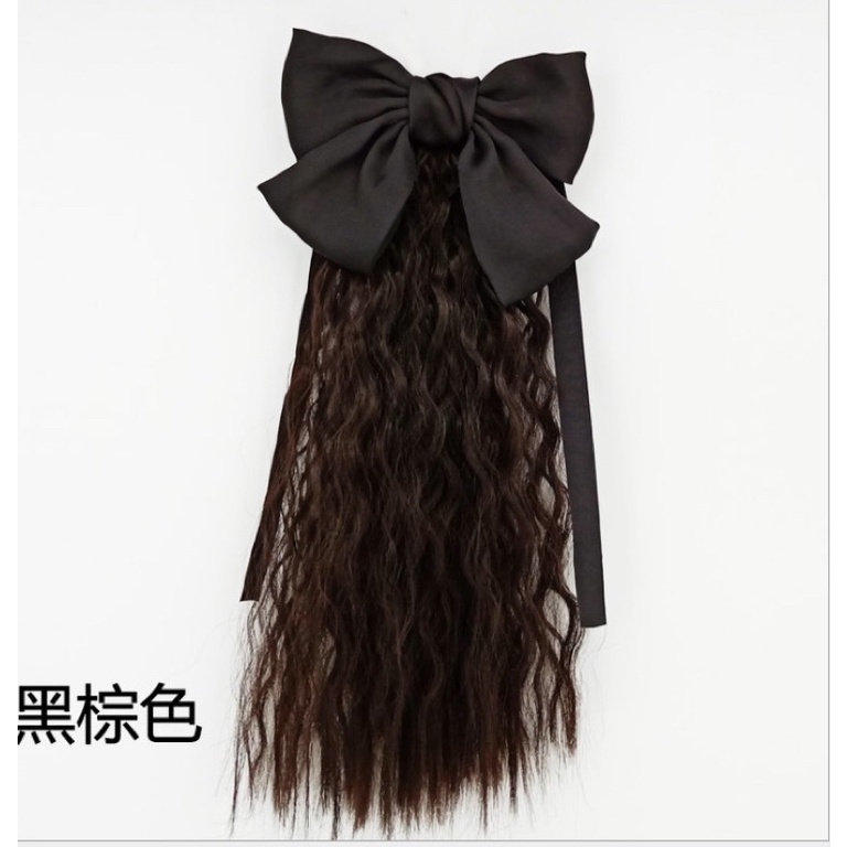 Tóc cột xoăn kèm nơ cho bé