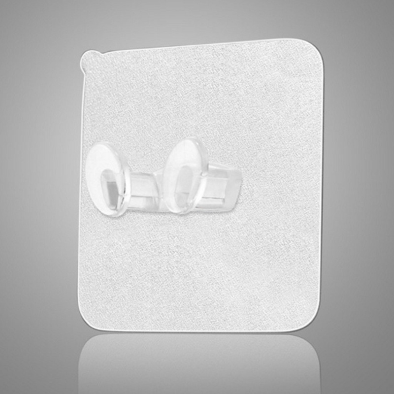 Giá đỡ phích cắm dán tường trong suốt tiện dụng