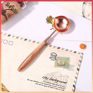Muỗng Múc Sáp Cán Gỗ