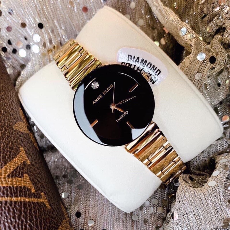 Đồng hồ nữ ANNE KLEIN model AK/2434BKGB tone vàng gold mặt đen sang trọng
