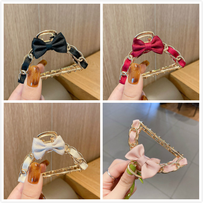 Kẹp tóc đính nơ thời trang nữ dễ thương