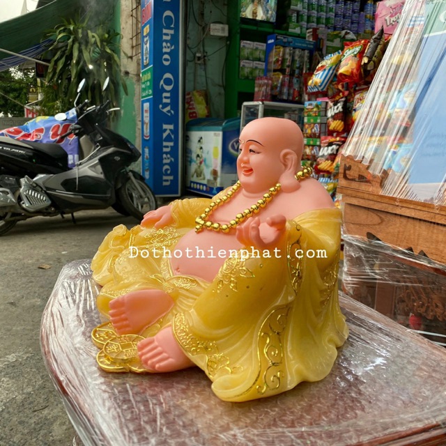 Tượng Phật di lặc đá 19in ngang 44cm màu vàng