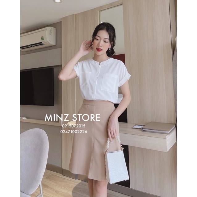 Chân váy chữ A công sở túi chéo 2 bên đến gối có đường mí giữa váy