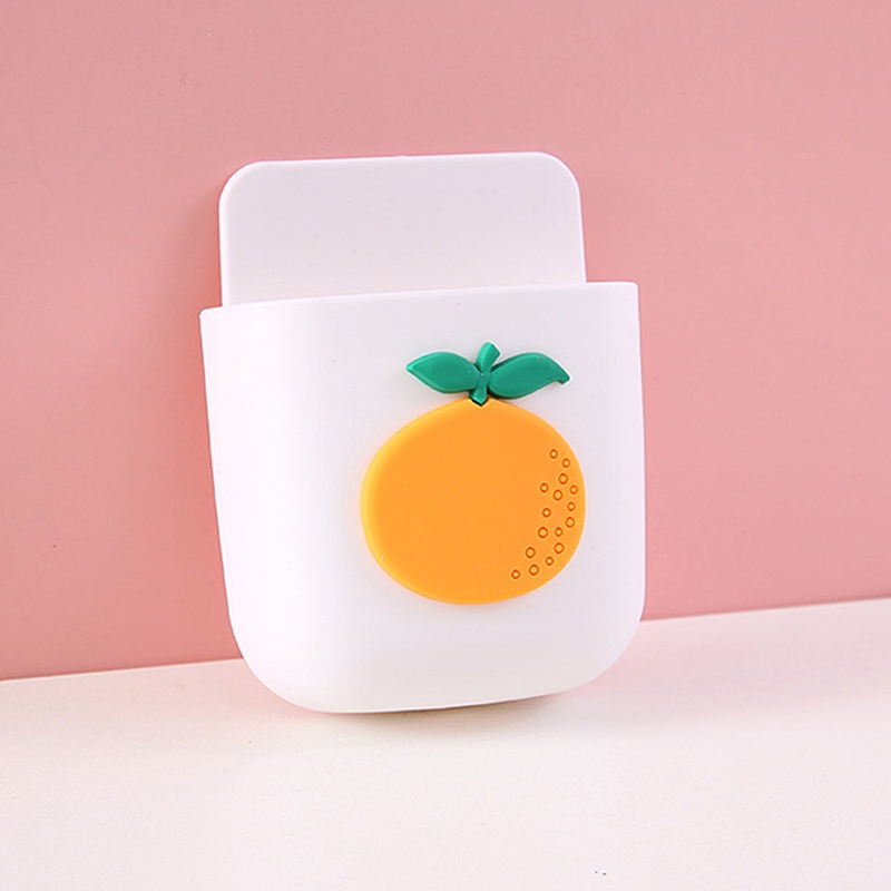 Ống để remote có lỗ sạc điện thoại dán tường độc đáo