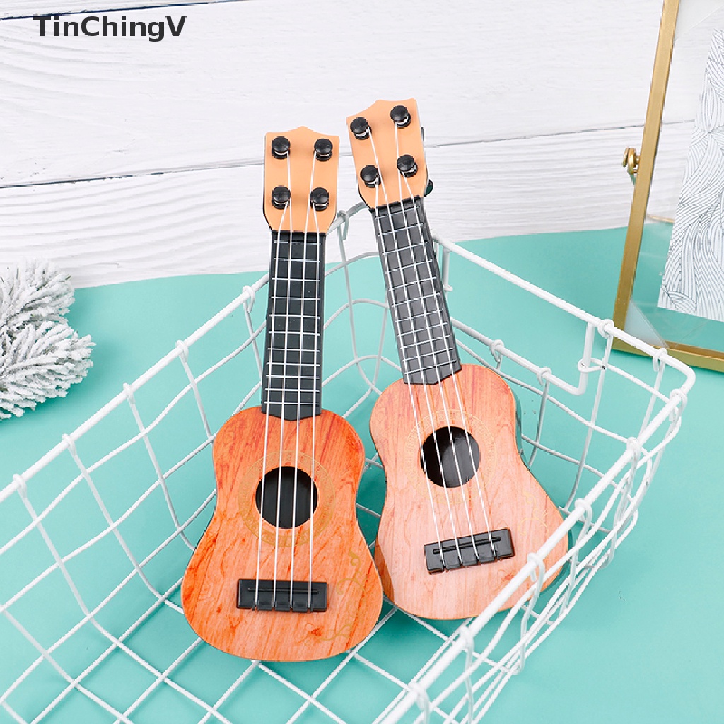 Đồ Chơi Đàn Ghita 4 Dây Mini Cho Bé