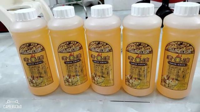 Tinh dầu massage thảo dược gừng nóng cao cấp