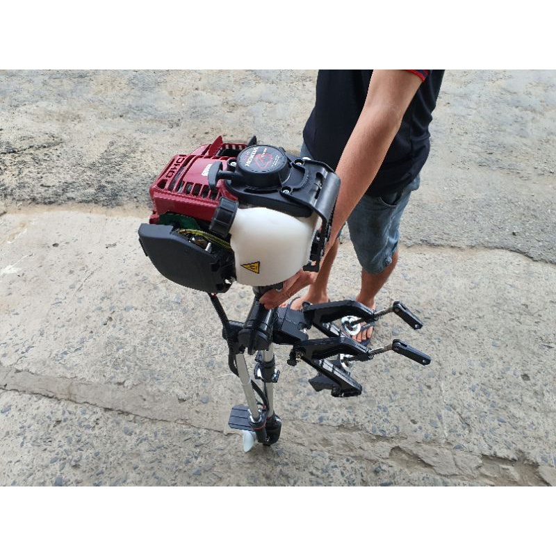 Máy chạy thuyền hơi 4 thì. Động cơ kèm dàn láp chân vịt đứng chạy xuồng và Ca Nô