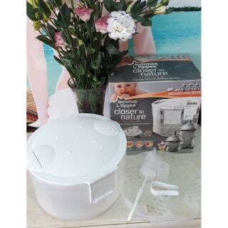 Tiệt trùng bình sữa và hâm ấm bằng lò vi sóng Tommee Tippee