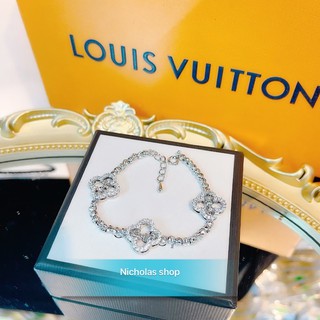 Lắc bi hoa 4 cánh mạ bạch kim