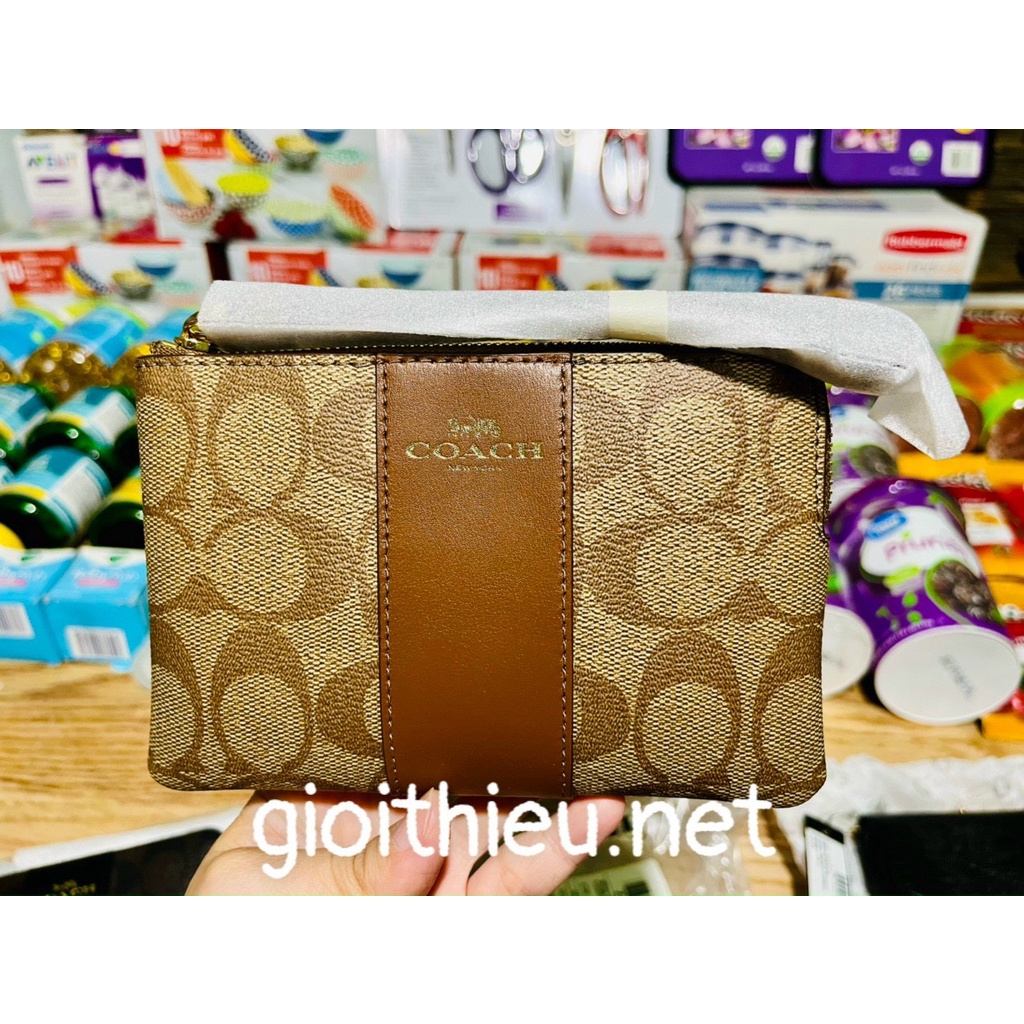Ví cằm tay thương hiệu Coach màu đen