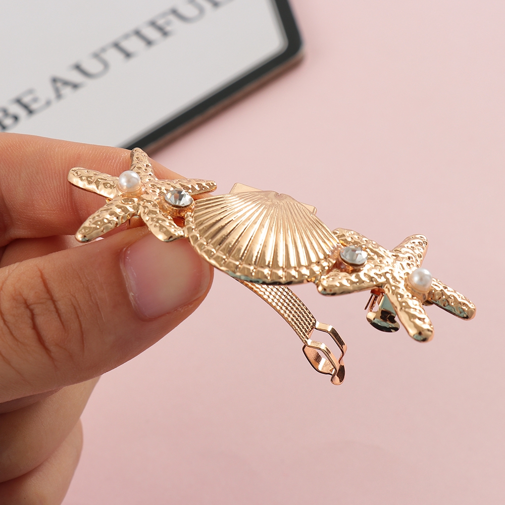 Kẹp tóc kim loại tạo hình lá độc đáo