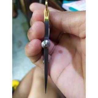 Compa cán vàng trong bộ nhấn mí