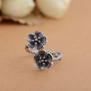 Nhẫn hoa mai bạc thái đối bông