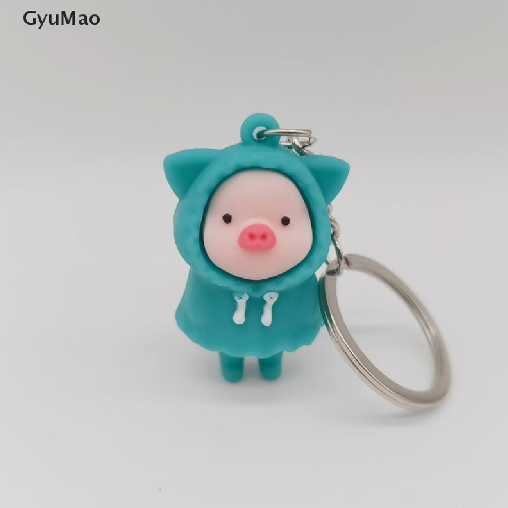 Móc khóa gắn hình chú heo con mặc áo mưa dễ thương