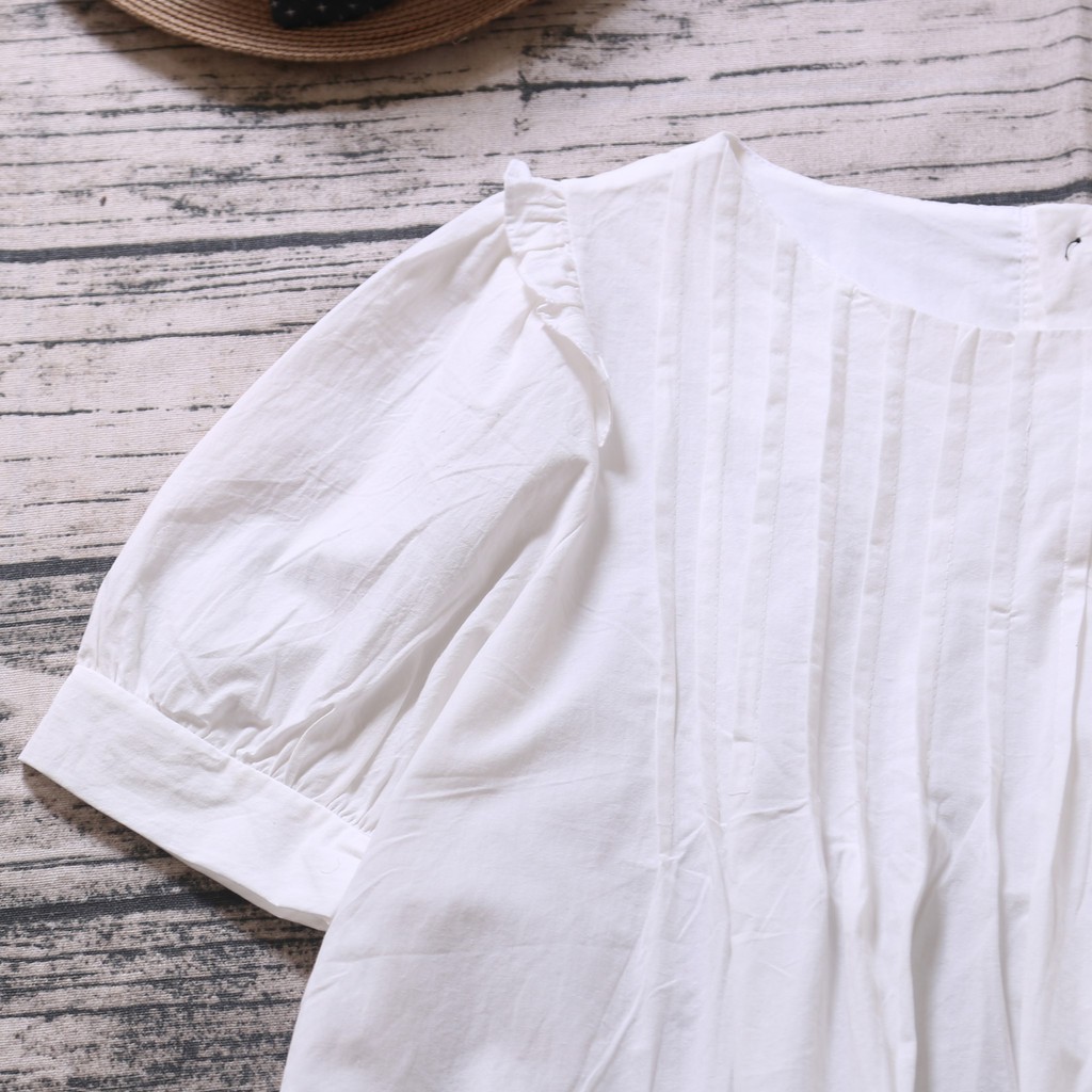 ÁO SƠ MI TRẮNG BABYDOLL XẾP LY TAY BỒNG