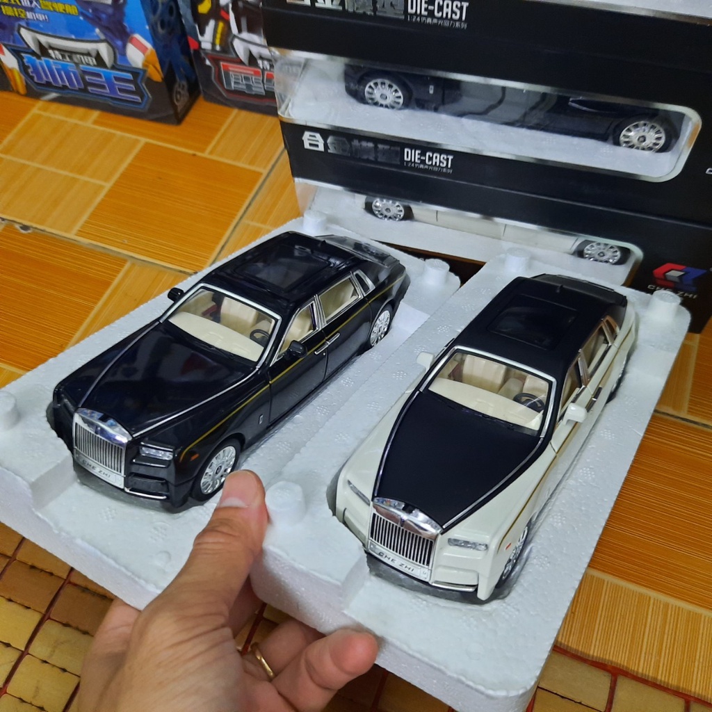 Mô hình xe ô tô Rolls- Royce Phantom tỉ lệ 1:24 hãng Che Zhi đồ chơi trẻ em bằng kim loại có âm thanh và đèn mở được cửa