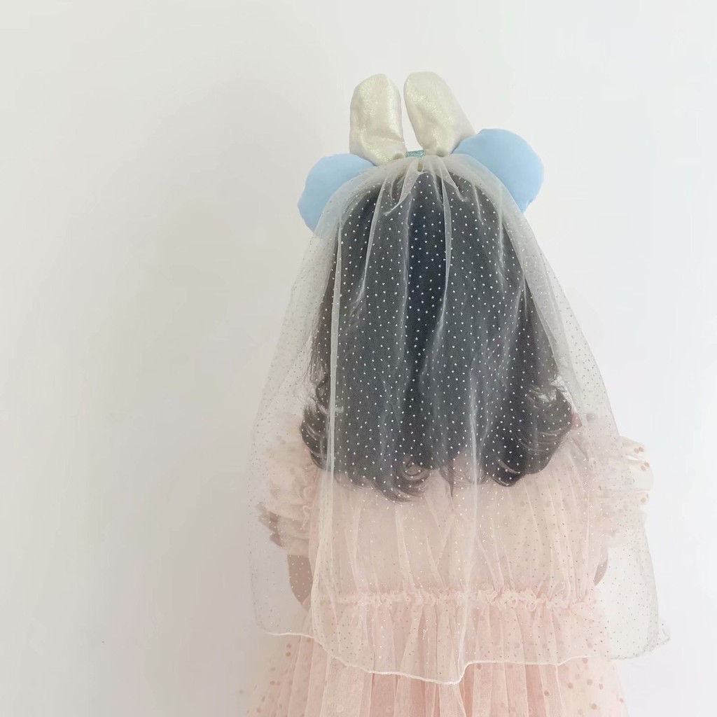 Cài nơ bạch tuyết cho bé
