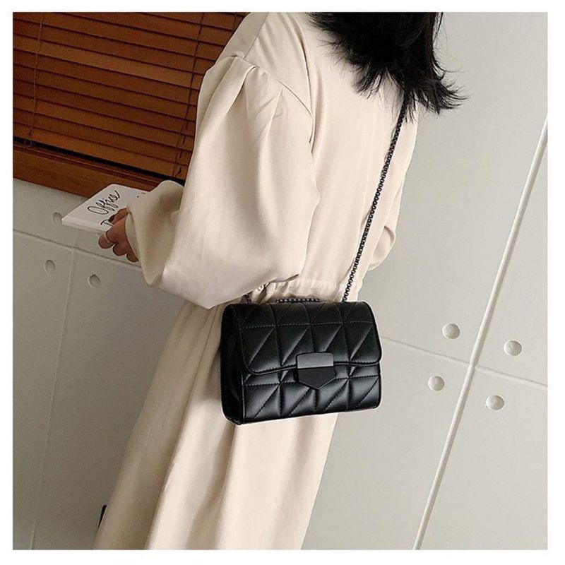 Túi khóa đen đeo chéo xinh xắn