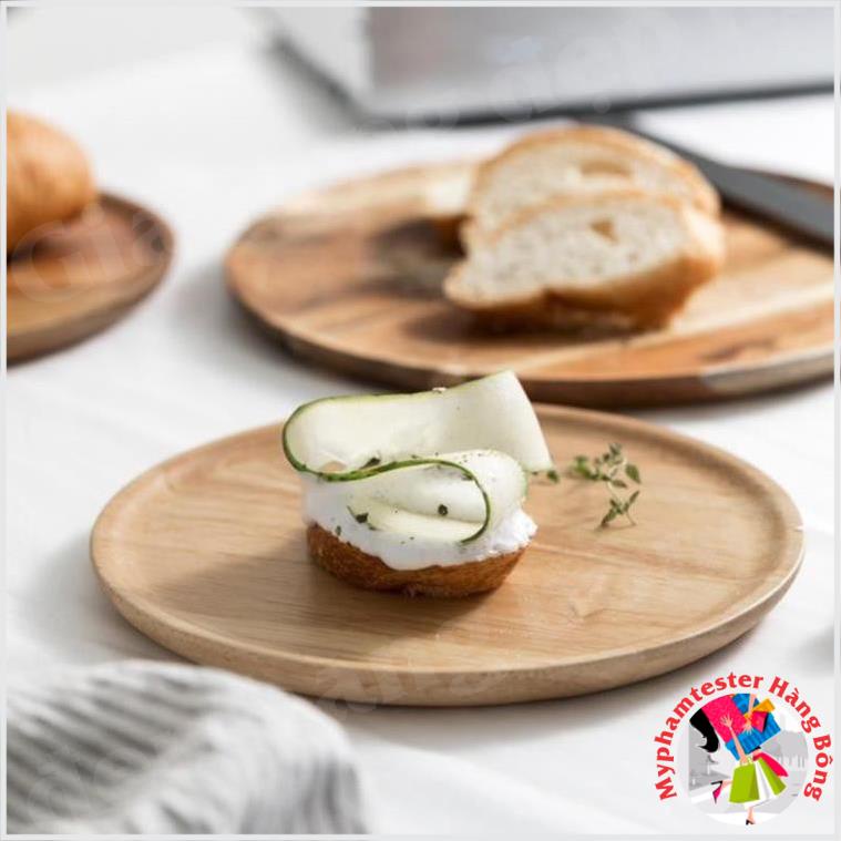 Khay gỗ tròn bày thức ăn