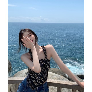 Áo yếm lụa màu đen quai dây xích.