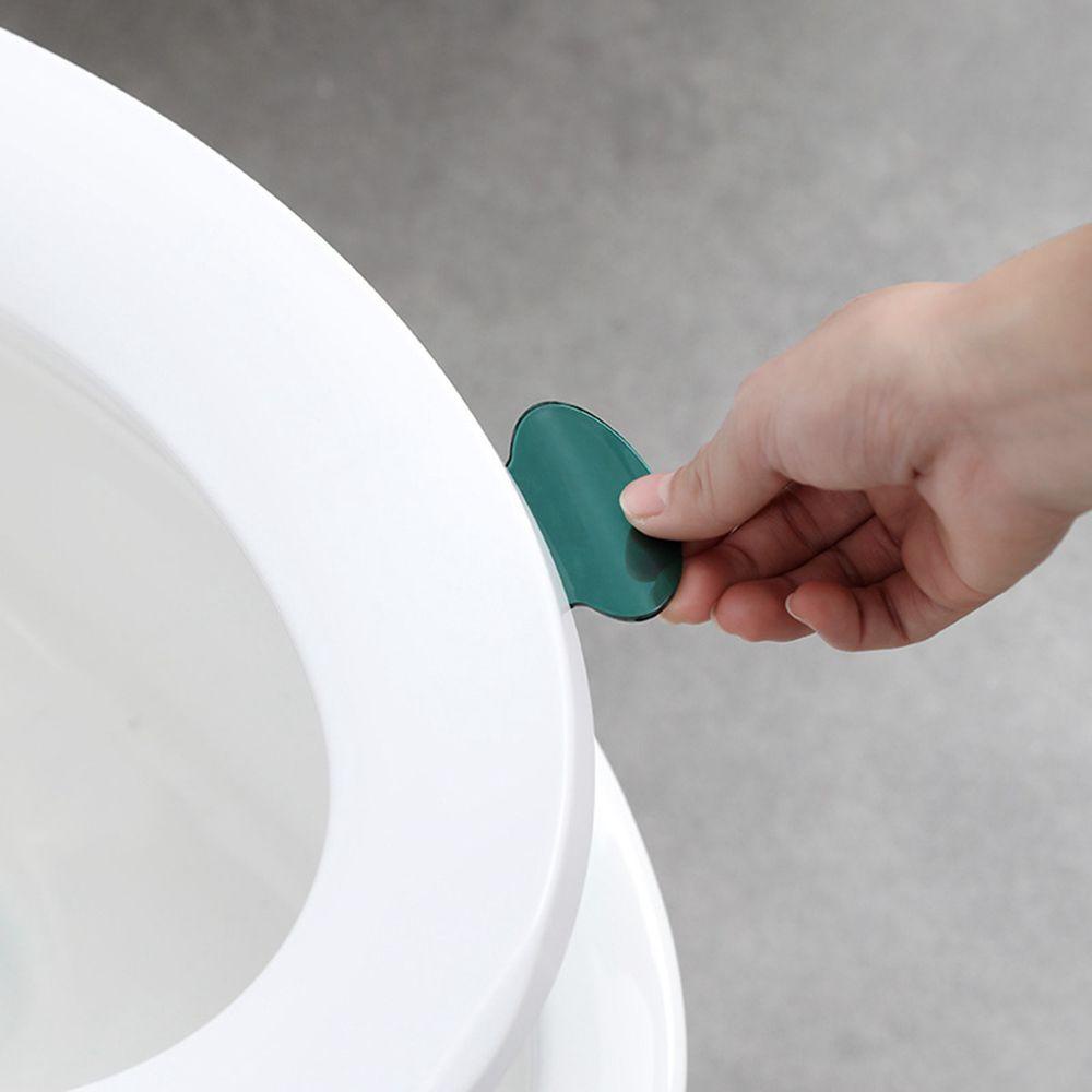 Tay Cầm Nhựa Trong Suốt Nâng Nắp Bồn Cầu Tiện Dụng