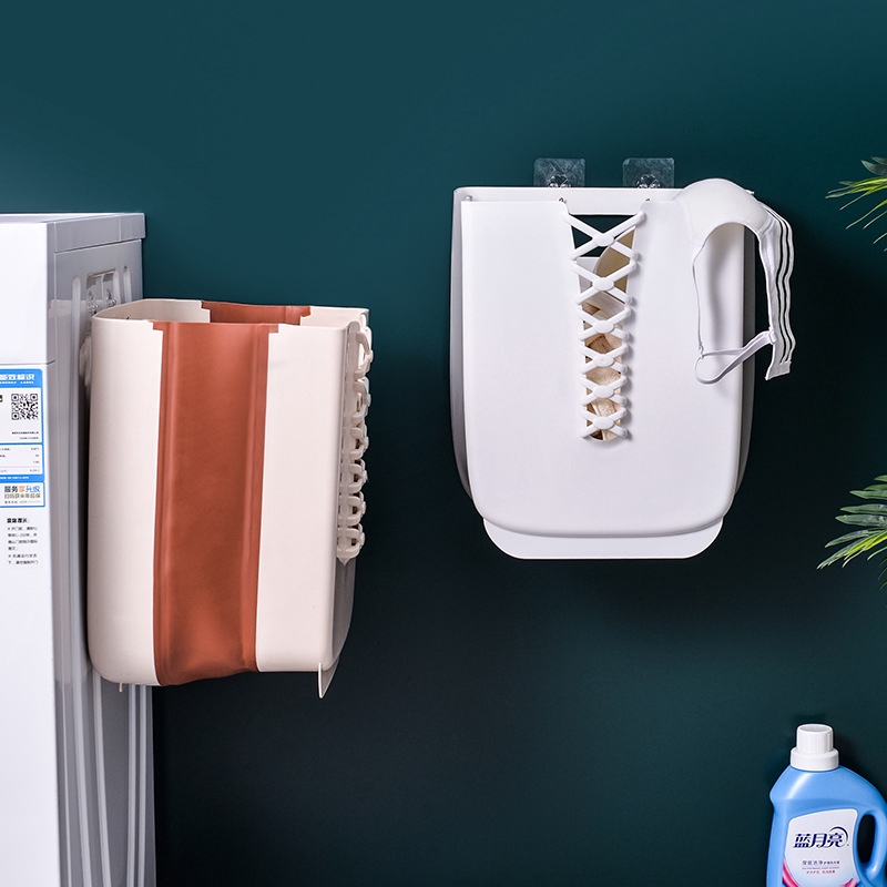 Collapsible wall mounted laundry basket