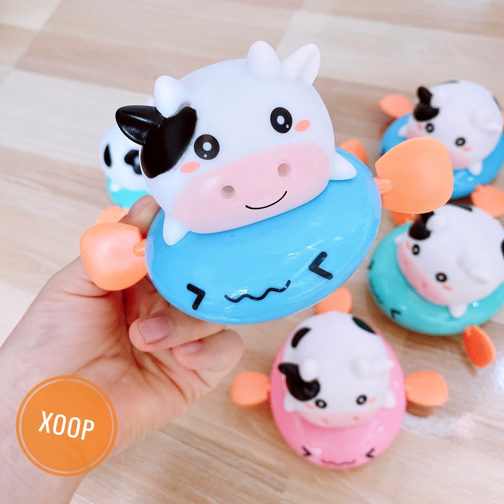Đồ chơi nhà tắm bò sữa chèo thuyền phun nước vặn cót ngộ nghĩnh đáng yêu cho bé
