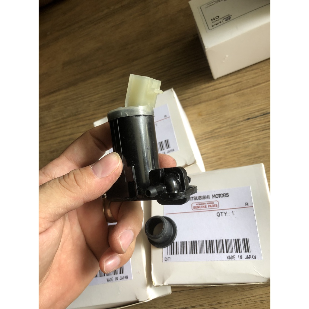 MÔ TƠ BƠM XỊT NƯỚC RỬA KÍNH MITSUBISHI XPANDER