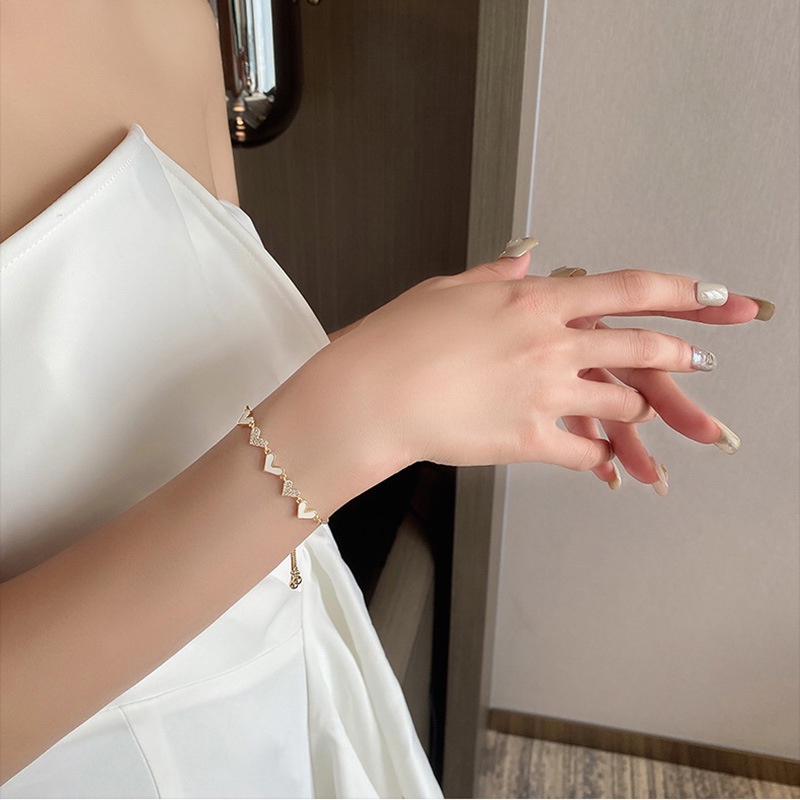 Vòng Tay Mạ Vàng Mặt Hình Trái Tim Đính Đá Lấp Lánh Thời Trang Hàn Quốc Cho Nữ