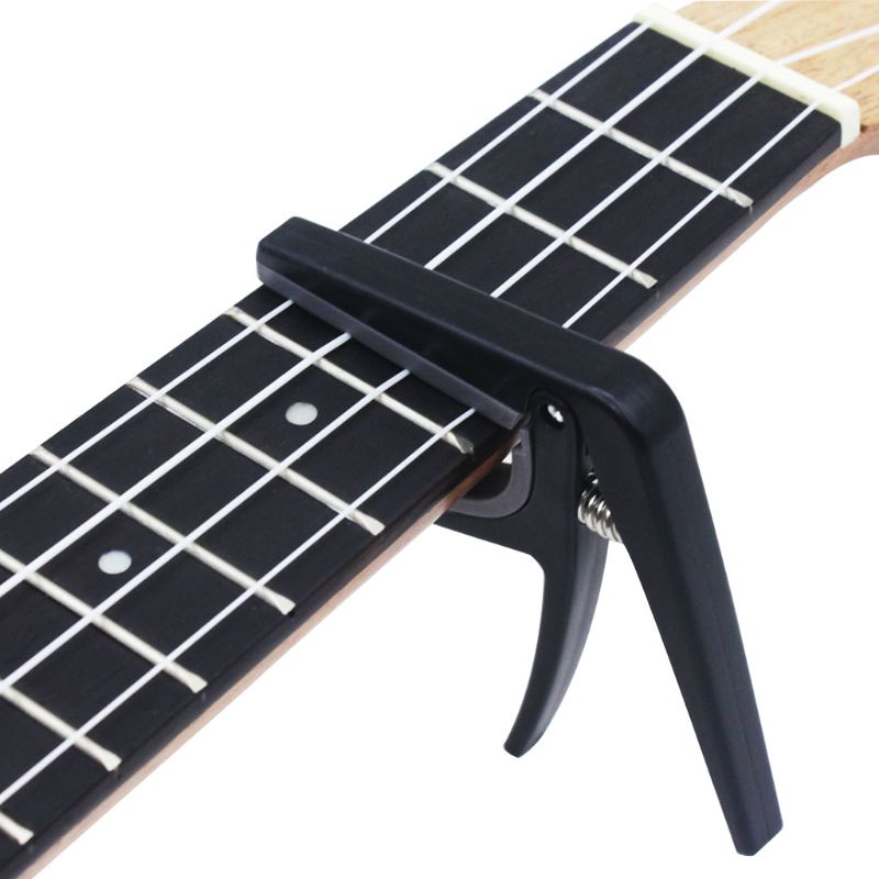 Capo 4 Dây Đàn Guitar Chuyên Nghiệp Có Thể Thay Đổi Nhanh Chóng