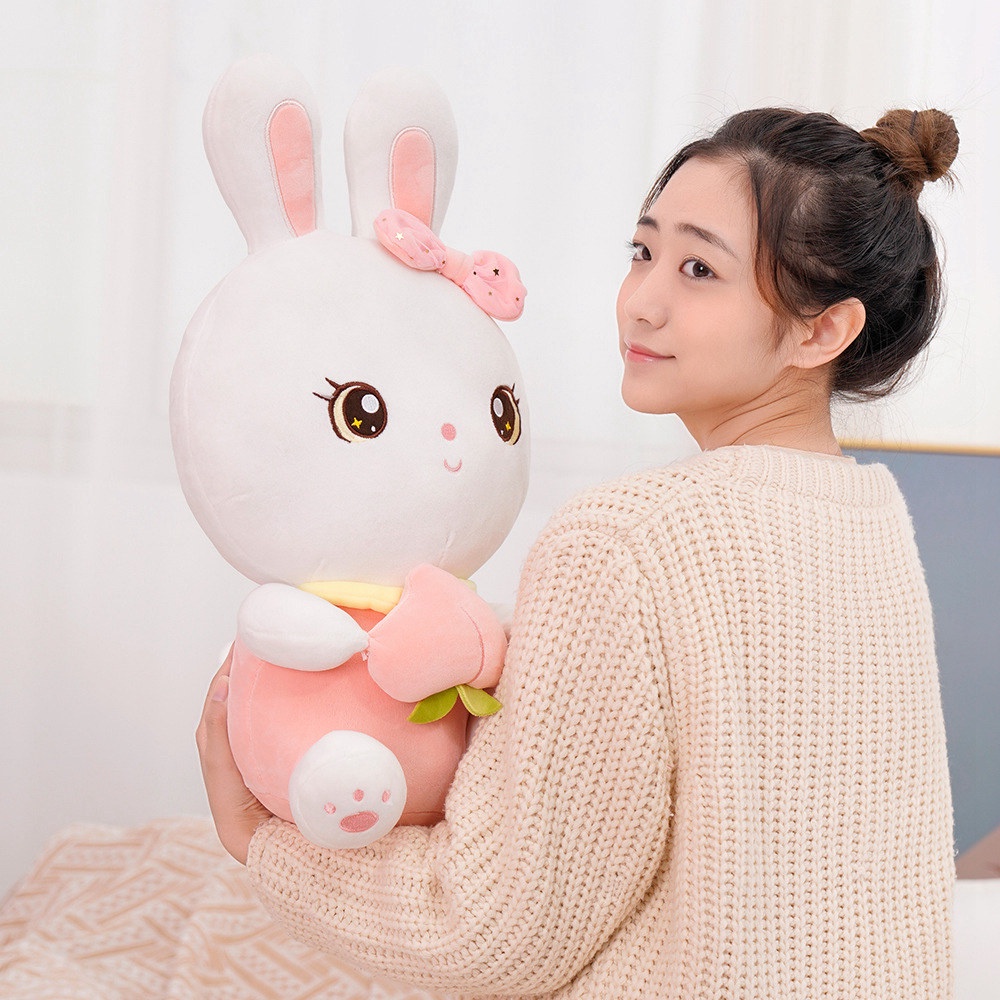 CÓ SẴNGấu bông thỏ trắng ôm đào dễ thương kích thước 40-55cm