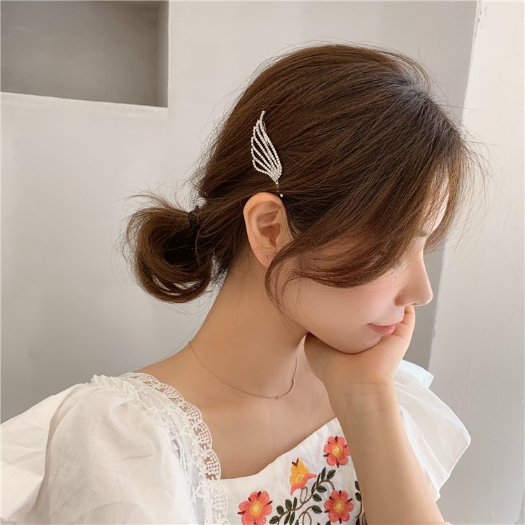 Kẹp tóc họa tiết cánh tiên đính đá lấp lánh TOC10